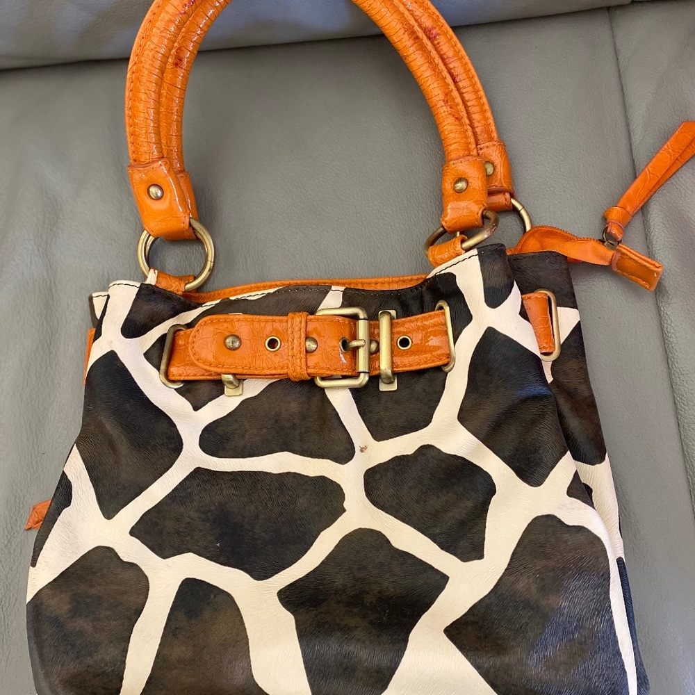Giraffe print hand bag